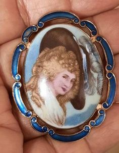 A signed Thomas Mott ( L.Mott ) enamel porcelain pendant convertible brooch necklace.  The chain is 10 inch drop...see pictures. The chain is gold plated on silver. The pendant is framed in a blue enameled frames scroll border with the porcelain cameo in domed form with a handpainted portrait of the Duchess in regency profile. The back is gold plated and the brooch part has a good unused pin, and signature TLM for Thomas Mott with made in England. About us: I deal in antiques and collectibles, m Victorian Style Enamel Pin Gift, Artistic Enamel Jewelry For Formal Occasions, Artistic Formal Brooch Jewelry, Vintage Cameo Enamel Jewelry, Victorian Enamel Pin Collectible, Vintage Enamel Cameo Jewelry, Victorian Enamel Collectible Pin, Vintage Cameo Jewelry In Enamel, Victorian Enamel Brooches For Gifts