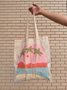 Hand Painted Beach bag, perfect for throwing sunscreen in and a towel. put all your beach essentials and hit the sand! Sand-colored Beach Bag For Everyday Use, Summer Beach Bag In Sand Color For Daily Use, Sand-colored Summer Beach Bag For Everyday Use, Sand-colored Summer Beach Bag For Daily Use, Summer Canvas Tote Bag For Vacation, Summer Sand-colored Beach Bag For Everyday Use, Summer Vacation Canvas Tote Bag, Sand-colored Summer Beach Bag, Beige Summer Canvas Bag For Beach Season