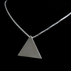 In honor of Stevie Nicks, I've recreated a similar version of her pyramid necklace in sterling silver! It's one inch in diameter and comes with several choices of a sterling silver box chain, 1.2mm thickness with a lobster claw attachment. I have given it a brushed matte finish. I offer a few chain length selections if you wish for a shorter or longer version. I make each one, per order, so please allow me 1-2 days for fabrication. I will send a shipment notification the moment I'm ready to ship Minimalist Pyramid-shaped Jewelry For Gifts, Nickel-free Triangle Sterling Silver Jewelry, Pyramid-shaped Sterling Silver Jewelry Gifts, Sterling Silver Pyramid Jewelry As Gift, Sterling Silver Pyramid Jewelry For Gifts, Handmade Triangle Sterling Silver Jewelry, Silver Triangle Necklace For Gift, Handmade Sterling Silver Triangle Jewelry, Unique Triangle Sterling Silver Jewelry