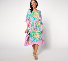 Look resort-ready in this flowing caftan. You'll be the belle of the beach when you show up in this tropical-printed cover-up. Pair it with some strappy sandals for a dockside dinner. From Denim & Co.® Fashions. Flowy Kaftan For Spring Vacation, Tropical Tunic Beach Dress For Vacation, Tropical Style Cover-up For Summer Vacation, Summer Tropical Kaftan For Vacation, Tropical Cover-up For Summer Beach Outings, Tropical Beach Season Cover-up For Summer Outings, Tropical Printed Cover-up For Resort Season, Tropical Printed Cover-up For Day Out, Flowy Tropical Kaftan For Summer