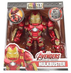 the action figure has an iron man suit on it's chest and is red with gold accents