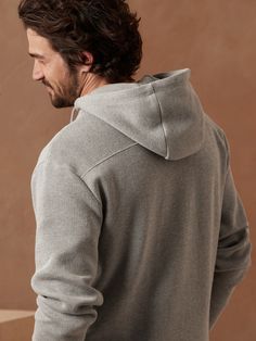 At once luxuriously soft and durable, this double-knit french ribbed hoodie is the perfect addition to your fall wardrobe with drawstring details for adjustable coziness.  Relaxed fit.  Hood.  Straight hem.  Relaxed fit.  Long sleeve.  Hits at the hi Ribbed Hoodie, Hoodie Men, Double Knit, Double Knitting, Fall Wardrobe, Heather Gray, Banana Republic, Heather Grey, Men Sweater