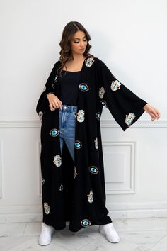 Featuring: Abaya Kimono Evil Eye & Hamsa Hand Embroidery Maxi Length Color: Black.Brand: Unmatched BYU Length: 55... Traditional Black Festive Kimono, Black Bohemian Style Festive Kimono, Black Embroidered Long Sleeve Kimono, Festive Black Bohemian Kimono, Festive Bohemian Black Kimono, Embroidered Long Kimono For Eid, Black Kimono With Floral Embroidery, Bohemian Embroidered Kimono For Eid, Festive Embroidered Kimono With Kimono Sleeves