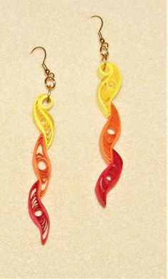 Handmade quilled paper earrings, quilling, quilled jewelry, paper earrings, quilled earrings, paper jewelry, fall earrings, autumn earrings Quilled paper earrings (090123) I love making quilled jewelry.; the possibilities are endless. The uniqueness of it appeals to the artistic side of our being. Many people are surprised when you tell them it is made from paper. I use a paper sealant on all my earrings.on all my earrings.  It not only makes them firm but also protects them from moisture. (They are not waterproof, however.) The paper part of these earrings measure approx. 2 3/4" in length.  The ear wires are gold plated. Wear these brightly colored earrings to your next party or gathering and you will be surprised at the reactions you receive when you tell people they are made from paper! Paper Quilling Earrings Unique, Paper Quilled Earrings, Quilling Jewelry Ideas, Quilling Earrings Jhumkas, Diy Quilling Earrings, Earrings Quilling, Earrings Paper, Paper Quilling Earrings, Quilled Earrings