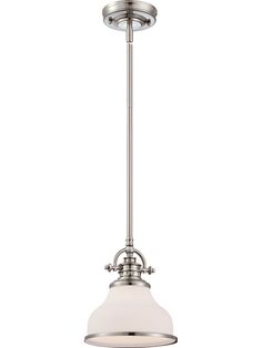 a light that is on top of a metal pole with a white glass shade hanging from the ceiling