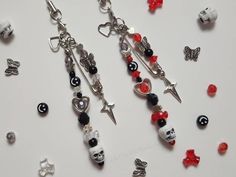 ❅❆For guaranteed delivery by Christmas please order before December 12th ♥Dream Skulls Phone Strap♥ ❀Cute for your phone case, collect books, or as a bag charm! ❀Each charm is approx 3 1/2 inches tall (not including phone strap/ball chain) ❀Handmade with a mix of plastic, acrylic, and metal beads + metal safety pin. ❀Comes with your choice of a silver phone strap or ballchain finish ❀Black and Red color options  ❀Crafted in a pet free and smoke free environment ♥Want a custom keychain? Or is the design you want sold out? Please send me a message or request a custom order!♥ ♥My shop offers flat rate shipping for all the items in your order, and free shipping if you spend $35 Red And Black Keychain, Safety Pin Backpack Charm, Alt Keychain, Red Phone Charm, Safety Pin Keychain, Goth Keychain, Safety Pin Charms, Jellyfish Jewelry, Pin Keychain