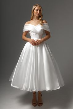 This enchanting tea-length wedding dress features a romantic off-the-shoulder design crafted from luxurious silky organza fabric. Important info: kindly be aware that the draping of fabric is a manual process, and there may be slight variations in the number and size of folds compared to the photo; the width of the lacing area on the back of the wedding dress can range from 1" to 6", depending on measurements and the level of tightening. Tea Length Wedding Dress With Veil, 50s Wedding Dress Vintage, Midi Wedding Dress Tea Length, Wedding Dress Civil Ceremony, Civil Ceremony Wedding Dress, Ceremony Wedding Dress, Hall Wedding Dress, Tea Length Wedding Dress Vintage, City Hall Wedding Dress