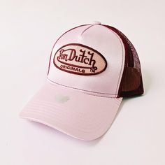 DEADSTOCK VON DUTCH CAP, STILL WITH TAGS AND ORIGINAL PACKAGING 100% AUTHENTIC, BRAND NEW WITH TAGS. Vintage baby pink satin / silk Von Dutch cap / Von Dutch Cap / Von Dutch trucker cap. satin material. embroidered classic white and red Von Dutch logo on front. red mesh back.  90s Y2K Cap FULLY TRACKABLE SHIPPING SERVICE. UK AND WORLDWIDE SHIPPING. Von Dutch Red Camo Hat, Pink Vintage Adjustable Baseball Cap, Retro Pink Snapback Baseball Cap, Pink Trucker Hat With Curved Visor, Vintage Pink Snapback Trucker Hat, Pink Vintage Snapback Trucker Hat, Retro Pink Trucker Hat, Trendy Pink Trucker Hat With Curved Visor, Retro Pink Hats With Letter Print