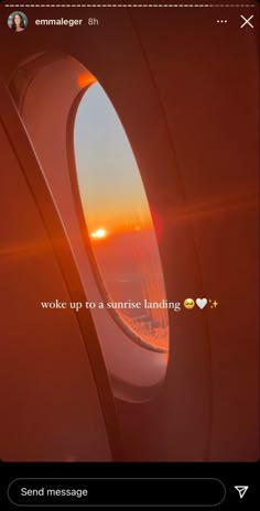 an airplane window with the words work up to sunrise landing