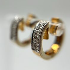 These 14K Yellow Gold Huggie Hoop Earrings are the perfect blend of elegance and sophistication. Each earring features a sleek, polished gold design adorned with a row of sparkling diamond accents that add a touch of brilliance and luxury. Measuring 16.4mm x 4.4mm and weighing 6.53 grams, these earrings are substantial yet comfortable for daily wear. The huggie style ensures a secure fit, making them a versatile choice for any occasion, from casual outings to formal events. With their timeless appeal, these earrings are a must-have addition to any jewelry collection, offering a classic look with a contemporary twist. Timeless Polished Huggie Earrings For Formal Occasions, Diamond Huggie Earrings With Polished Finish, Timeless Polished Finish Huggie Earrings For Formal Occasions, Timeless Formal Round Huggie Earrings, Fine Jewelry Huggie Hoop Earrings For Formal Events, Fine Jewelry Huggie Hoop Earrings For Formal Occasions, Timeless Diamond Cut Huggie Earrings For Formal Occasions, Modern Prong Set Huggie Earrings For Formal Events, Timeless Hoop Huggie Earrings For Anniversary