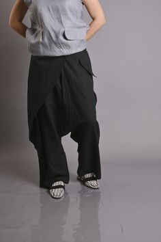 Linen Pants, Harem Pants, Beige Pants ◾ Black LINEN pants. Loose harem pants. Summer comfortable quality linen pants. Natural linen pants. The pants are very comfy. These pants are both sports and everyday.  You can go to work with them, you can also wear them in the free days. They have a sporty elegant style.  Loose fitting. ✂ Fabric: 100% lINEN Model wearring size S. Heigth: 176 cm- 5"8 inches Fabric: ►Quality NATURAL linen fabric. medium weight (200 g) linen fabric Model wearring size S. ◾ T Traditional Spring Pants With Pockets, Traditional Spring Bottoms With Pockets, Bohemian Baggy Straight Pants, Traditional Baggy Pants For Spring, Traditional Style Baggy Pants For Spring, Traditional Baggy Wide Leg Pants, Traditional Black Wide Leg Bottoms, Traditional Baggy Bottoms For Spring, Traditional Wide Leg Pants With Pockets