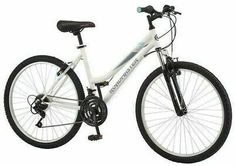 a white and black bike on a white background