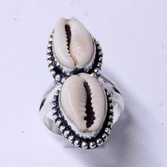 Weight of ring 5.5 Gm Head Sell Size 11x33 mm (APPROX.) 100% Cowrie shell natural stone, Metal:Sterling Silver Stamped:925 i make jewelry for a very special kind of Women's men's ,This stunning is handcrafted by one of our talented artisans. It is set in precious Fine Jewelry 925 Sterling Silver Jewelry, Polished to a brilliant luster> You can also contact us for a separate order, or place an order? Send items back within: 30 days of delivery Request a cancellation within: 2 Hours of purchase Silver Shell-shaped Rings For Beach, Silver Shell Rings For Beach, Handmade Oval Jewelry For Beach, Silver Shell Rings For Gift, Silver Shell-shaped Ring For Gift, Elegant Handmade Rings For Summer, Vintage Summer Ring Jewelry, Handmade Elegant Summer Rings, Elegant Handmade Summer Rings