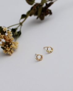 Small minimalist circle studs, 14k solid yellow gold. 14k yellow gold Length: 0.5 cm/ 0.2 inch Closer: silicon pushback Packed in labeled gift box free to contact me for details and special requests All items can be ordered in solid 14k/18k yellow, white or rose gold Please review terms and conditions before checkout for more earrings: https://www.etsy.com/shop/YajewelryShop?ref=simple-shop-header-name&listing_id=835222373&section_id=19741014 Dainty Circle Earrings In 14k Gold, Dainty 14k Gold Circle Earrings, 14k Gold Circular Earrings, Dainty Yellow Gold Circular Earrings, Delicate Tarnish Resistant Round Earrings, Delicate Round Tarnish-resistant Earrings, Delicate Tarnish-resistant Round Earrings, Dainty Circle Earrings For Pierced Ears, Dainty Circular Earrings