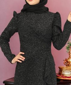 The fabric of the dress is 95 percent polyester and 5 percent elastin.  It is a lined dress.  The measurements of the dress in the picture are size 38, chest 92 cm, waist 72 cm, hips 96 cm.  Dress length is 160 cm. Modest Long Sleeve Abaya For Party, Fitted Maxi Length Abaya For Party, Fitted Maxi Length Party Abaya, Floor-length Fitted Abaya For Party, Fitted Floor-length Party Abaya, Fitted Black Abaya For Eid, Party Floor-length Fitted Abaya, Modest Long Sleeve Party Maxi Dress, Modest Long Sleeve Maxi Dress For Party