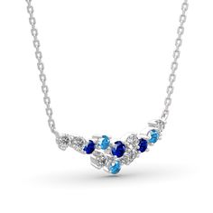 Dazzling with colour, this fashion necklace is certain to receive instant compliments. Created in sterling silver, this intriguing style showcases an array of stones - light blue, midnight blue and white stones - all placed along a curved bar design. Add this masterpiece to your jewelry box and you won't be disappointed.Carat Weight: 3.07 ctStone Size: 3,3.5,3 mmStone Type: Jeulia® StoneNumber of Stones: 12 Stone Shape: RoundStone Color: Diamond White, Aquamarine Blue, Sapphire BlueWeight: 2.1 g Sapphire Necklace With Sparkling Stones For Anniversary, Blue Sapphire Pendant Diamond Necklace, Light Blue Sterling Silver Birthstone Necklace, Blue Stones Fine Jewelry, Fine Jewelry With Blue Stones, Blue Fine Jewelry With Stones, Fine Blue Jewelry With Stones, Light Blue Birthstone Necklace In Sterling Silver, Sapphire Diamond Necklace With Sparkling Stones