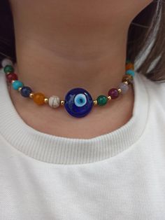 material: Color natural stone Made of natural stones, this necklace consists of all kinds of natural stones. It will give you positive energy and healing. It will look great on your neck. Please feel free to send me a message about the product and I will reply you immediately. https://www.etsy.com/shop/Hirajewelrydesign?ref=seller-platform-mcnav Holistic Beaded Necklaces With Natural Stones For Gifts, Spiritual Beaded Necklaces With Natural Stones As A Gift, Handmade Crystal Necklaces For Healing, Holistic Multicolor Round Beads Necklaces, Festival Agate Beaded Necklaces With Round Beads, Healing Crystal Necklaces With Colorful Round Beads, Holistic Beaded Necklace With Gemstone Beads For Gift, Spiritual Beaded Necklace With Colorful Beads As A Gift, Amulet Style Beaded Necklace With Natural Stones For Gift