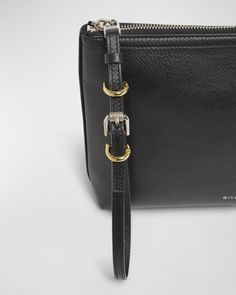 Givenchy "Voyou" travel pouch wristlet in cotton and leather     Adjustable wristlet strap    Zip top closure     Interior, one slip pocket     Approx. 7.9"H x 2.6"W    Made in Italy Travel Pouch, Zip Top, Sale Design, Givenchy, Neiman Marcus, Top Designers, Timeless Elegance, Tops Designs, In Italy