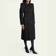 Balenciaga hourglass coat Peak lapels; double-breast Long sleeves; button cuffs Chest welt pocket; hip flap pockets Mid length Wool/cupro/cotton Made in Italy Designer Wool Coat With Double Button Closure For Office, Designer Wool Coat With Double Button For Office, Designer Wool Coat With Double Button Closure For Work, Designer Double-breasted Wool Coat For Work, Elegant Formal Wool Coat With Pockets, Elegant Wool Coat With Pockets For Formal Occasions, Designer Double-breasted Wool Coat For Formal Occasions, Designer Formal Wool Coat With Double Button, Formal Double-breasted Wool Coat With Pockets