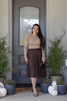 Lennon features a brown faux suede, in a knife pleat and elastic waistband. Dress it up or wear it casual! Modeled in large, and paired with our new Ashlyn knit top. 90% Polyester/10% Spandex Small (waist 28-30"/length27") Medium (waist 30-32"/length 27") Large (waist 32-34"/length 27") Fitted Skirt With Elastic Waistband For Fall, Brown Pleated Skirt For Night Out, Fall Pleated Skirt With Elastic Waistband, Casual Pleated Skirt With Elastic Waistband For Fall, Fall Stretch Pleated Skirt, Pleated Stretch Skirt For Fall, Elegant Brown Pleated Skirt For Fall, Fitted Lined Pleated Skirt For Fall, Fall Brown Pleated Skirt With Pleated Hem