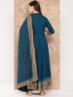 Size: please Check the last image above for a complete size chart. Blue printed Kurta with Palazzos with dupattaKurta design: Ethnic motifs printed Anarkali shape Empire style Mandarin collar, three-quarter regular sleeves Calf length length with flared hem Viscose rayon machine weave fabric Palazzos design: Printed Palazzos Elasticated waistband Slip-on closure Material & Care Kurta Fabric : RayonPalazzo Fabric : RayonDupatta : RayonHand Wash Blue Bohemian Kurta With Dupatta, Bohemian Blue Embroidered Sets, Bohemian Embroidered Blue Sets, Blue Kurta With Printed Motifs, Traditional Drape, Blue Bohemian Salwar Kameez With Dupatta, Bohemian Blue Salwar Kameez With Dupatta, Blue Kurta With Printed Motifs For Transitional Season, Blue Bohemian Kurta With Resham Embroidery, Bohemian Blue Salwar Kameez With Resham Embroidery