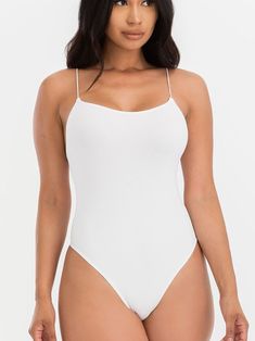 Soft and stretchy seamless bodysuit 92% Nylon, 8% Spandex Model is 5’7 and is wearing a size S/M Seamless Solid Color One-piece Bodysuit, Solid Color Elastane One-piece Bodysuit, Solid Bodycon Smoothing Bodysuit, Stretch Bodysuit With Built-in Bra, Camisole Bodysuit With Lined Body, Lined Bodysuit Camisole, High Stretch Smoothing One-piece Bodysuit, High Stretch One-piece Bodysuit With Lined Body, Solid Camisole Bodysuit With Lined Body