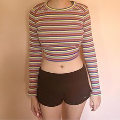 Multicolor Target Wild Fable Long-Sleeve Crop Top This Rainbow/Multicolor Top From The Target Brand Wild Fable Is In Perfect Condition And Still Has The Original Tags! It's So Comfortable And A Great Top To Wear To Elevate A Simple Outfit. The Tag Is Marked As A Medium But It Can Be Worn By Smaller Or Larger Sizes (It's Fairly Stretchy). Colorful Long Sleeve Color Block Tops, Yellow Color Block Long Sleeve Top, Trendy Rainbow Print Long Sleeve Tops, Trendy Long Sleeve Rainbow Print Tops, Colorful Fitted Long Sleeve Tops, Trendy Long Sleeve Tops With Rainbow Print, Colorful Retro Long Sleeve Tops, Colorful Long Sleeve Retro Tops, Trendy Long Sleeve Rainbow Tops