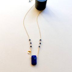 We think Lapis Lazuli is just about one of the coolest stones. We spent months finding this one for the perfect deep blue color cut to reflect the light. This unique version is handmade, of course, and designed to be layered with multiple styles in our collection. 14k gold plated with a spring ring clasp and adjustable length 16-18". Luxury Elegant Lapis Lazuli Necklace, Modern Blue Sapphire Jewelry, Blue Birthstone Jewelry For Healing, Dainty Blue Sapphire Jewelry, Minimalist Blue Jewelry For Everyday, Minimalist Lapis Lazuli Blue Jewelry, Yellow Gold Lapis Lazuli Minimalist Jewelry, Yellow Gold Lapis Lazuli Jewelry With Natural Stones, Minimalist Yellow Gold Lapis Lazuli Jewelry