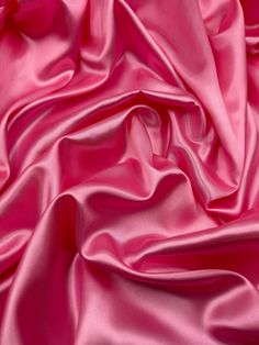 Pink satin fabric Add a delicate touch to your apparel, curtains, bedding, costumes, and crafts with this pink satin fabric. Its light fabric weight and solid/plain pattern make it a versatile choice for any project. Measuring 58 inches wide, this fabric is perfect for draperies, cushions, and everyday clothing. The exact colour of the fabric is baby pink, making it an ideal choice for weddings, decorations and bridal wear. Use this fabric for draping and create a soft, romantic atmosphere. This Satin Fabric Texture, Wear It Pink, Pink Satin Fabric, Everyday Clothing, Romantic Atmosphere, Pink Vibes, Satin Color, Polyester Dress, Pink Silk