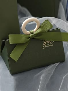 a green box with a white ring on it