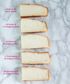 four slices of white bread sitting on top of a counter