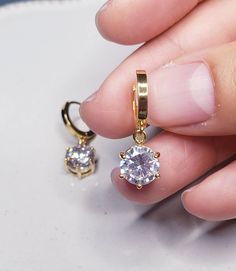 About 2 cm in length. Solid 14k gold posts. Especially good for people with metal allergies. Classic Gold Cubic Zirconia Earrings, Gold Teardrop Huggie Earrings In Cubic Zirconia, Gold Teardrop Huggie Earrings With Cubic Zirconia, Classic Gold Crystal Earrings With Cubic Zirconia, Gold Dangle Jewelry With Prong Setting, Small Hoop Cubic Zirconia Crystal Earrings For Gift, Small Hoop Crystal Earrings With Cubic Zirconia As Gift, Elegant Gold Huggie Earrings With Prong Setting, Elegant Gold Crystal Earrings With Prong Setting