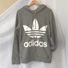 Grey Adidas Logo Hoodie Casual Hoodie With Logo Print For Fall, Casual Fall Hoodie With Logo Print, Adidas Logo Hoodie Sweatshirt For Fall, Adidas Sweatshirt With Logo For Fall, Adidas Sweatshirt For Fall, Adidas Logo Hoodie For Fall In Athleisure Style, Adidas Logo Athleisure Hoodie For Fall, Adidas Logo Hoodie For Fall, Trendy Spring Hoodie With Logo Print