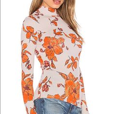 Bundles And Reasonable Offers Usually Accepted Casual Turtleneck Tops For Spring, Spring Orange Stretch Tops, Casual White Mock Neck Top For Fall, Winter Stretch Floral Print Tops, Trendy Floral Print Tops For Winter, Trendy Winter Floral Print Tops, Fitted Orange Top For Fall, Trendy Stretch Mock Neck Top For Spring, Spring Casual Stretch Mock Neck Top