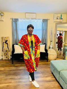 This African print duster kimono is made with the 100% cotton African wax  print.  It's a must have piece that can be styled in different ways, you can rock it over a fitted dress, skirt, shorts or pants.   Is a free size Patterned Kimono With Vibrant Print, Multicolor Short Sleeve Kimono, Fitted Casual Kimono With Kimono Sleeves, Casual Fitted Kimono With Kimono Sleeves, One Size Patterned Kimono, Fitted Casual Cotton Kimono, Casual Fitted Cotton Kimono, Oversized Cotton Kimono With Open Front, Red Long One Size Kimono