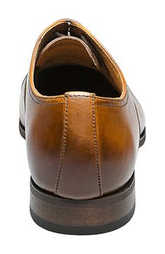 A classic leather oxford with a sleek square toe delivers polished style to your office-to-weekend looks. Square toe Topstitched cap toe Lace-up closure Cushioned footbed Stacked sole Leather upper, textile lining, rubber sole Imported Business Casual Cap Toe Derby With Leather Lining, Classic Leather Derby With Cap Toe, Leather Cap Toe Derby For Business, Timeless Leather-lined Oxfords For Office, Formal Derby Shoes With Leather Footbed, Formal Derby With Leather Footbed, Business Casual Cap Toe Derby, Oxford Almond Toe Derby For Office, Formal Oxfords With Leather Footbed And Plain Toe