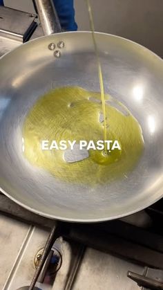 a frying pan with some food in it and the words easy pasta on top