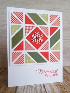 a christmas card with a snowflake design on it and the words merry wishes