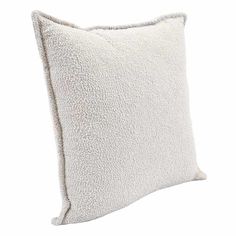 a white pillow on a white background