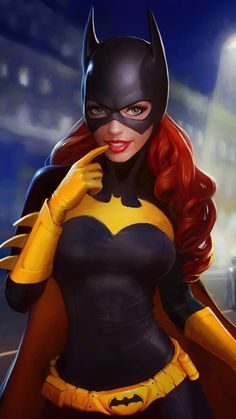 a woman dressed as batgirl with red hair