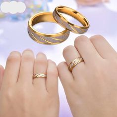 two women's hands with wedding rings on their fingers and one woman's hand holding