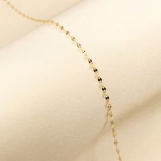 Sprinkle some sparkle into your life with our Glitter Chain! Made of 14k solid gold, this delicate and dainty chain has just the right amount of shimmer to add a subtle glow to any outfit. Stun everyone with your subtle shine. Gold KT: 14K Solid Gold Gold Color: Yellow Gold Chain Lengths: 14", 16", 18", 20" Chain Widths: 1.5 mm, 2 mm Chain Style: Glitter Chain Clasp Closure: Spring Ring Chain Photography, White Gold Chains, Pink Box, Dainty Chain, Yellow Gold Chain, Bora Bora, Short Necklace, Gold Gold, Chain Styles