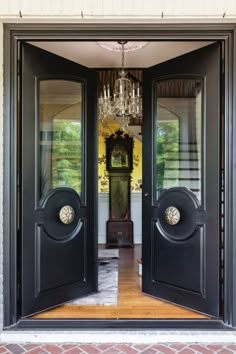 These Neoclassical French double doors embody a perfect blend of refined elegance and classical design. These double doors are a statement piece that exudes classical refinement and luxury, ideal for a grand entryway or as a focal point in a stately room, where they bring an air of timeless beauty and tradition to any space. Included with Your Masterpiece Door: Pre-Hung Door Unit Emtek Ball Bearing Hinges- Mortised with screw holes drilled for installation T-astragal attached to the inactive door Anodized Aluminum Adjustable Bronzed Threshold Bronzed Weather Stripping Bronze Door Sweeps Attached to the Doors Art Deco Front Door, Front Foor, French Doors With Transom, Traditional French Doors, Black French Doors, Single French Door, Neoclassical Home, Double Front Entry Doors, French Double Doors