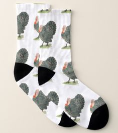 a pair of socks with turkeys on them