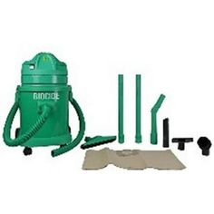 a green vacuum is shown with tools for cleaning