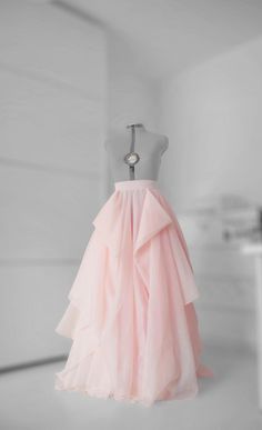 Absolutely gorgeous layered draped blush wedding skirt! Perfect choice for your special day or photo session. I can make it all colors. What you have to send when you place an order: 1. Waist round measurement (cm or inch) 2. Straight line from waist to floor. This is not skirt length. 3. If you want to change the color. 4 Phone number for delivery. NOTE: Real colors can't be 100% same as the pics because of camera and monitor effect! ALL SALES FINAL. This shop is custom shop so when you place a Evening Organza Ruffled Skirt, Evening Ruffled Organza Skirt, Pink Voluminous Ruffled Maxi Skirt, Pink Ruffled Voluminous Maxi Skirt, Voluminous Pink Maxi Skirt With Ruffles, Pink Maxi Skirt With Ruffles, Elegant Fitted Pink Draped Skirt, Elegant Floor-length Ruffled Skirt, Pink Organza Skirt For Wedding