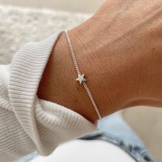 ✧ T H E ~ D A I N T Y ~ S T A R ~ B R A C E L E T ✧ This listing is for one dainty silver plated star bracelet!  ✧ Dainty silver plated star feature charm on silver plated chain.  ✧ Every bracelet has a clasp and 1'' extender to adjust perfectly to you.  ✧ Model wears size XS. Select your length from the drop down list, full details below.  ✧ Star charm can move on chain, it is not fixed in place.  ✧ Pearl and moonstone bracelets sold separately.  ✧ S I Z E ~ G U I D E ✧ ✧ This bracelet comes in Moonstone Bracelets, Star Bracelets, Silver Star Bracelet, Bracelet Star, Stars Gifts, Hammered Earrings, Women's Jewelry Sets, Bracelet Dainty, Moonstone Bracelet