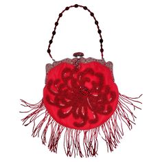 Introducing the Larissa Barrera Red Embellished Evening Bag, a stunning and unique accessory that exudes elegance and charm. This eye-catching evening bag features exquisite details that elevate its beauty to new heights. Crafted in a vibrant red hue, this evening bag is adorned with a beaded strap for added glamour. The front of the bag showcases a stunning flower-like beaded embellishment, while the back is covered in red sequins, adding a touch of sparkle and sophistication. The show-stopping feature of this bag is the beaded fringe cascading from the bottom, creating a captivating and dynamic effect with every movement. This intricate detail adds a playful and whimsical touch to the bag, making it a true statement piece. Perfect for adding a personal touch to your evening look, the Lar Gucci Coat, Beaded Strap, Manolo Blahnik Heels, Versace Dress, Red Sequin, Gowns Of Elegance, Evening Look, Beaded Fringe, Accessories Unique