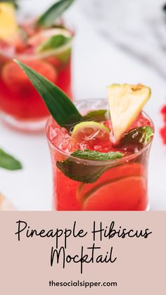 the pineapple hibiscus mojiti is served in glasses with garnishes