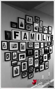 black and white photograph of family pictures on the wall